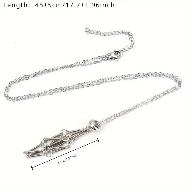 Pendentif argenté cage à cristaux