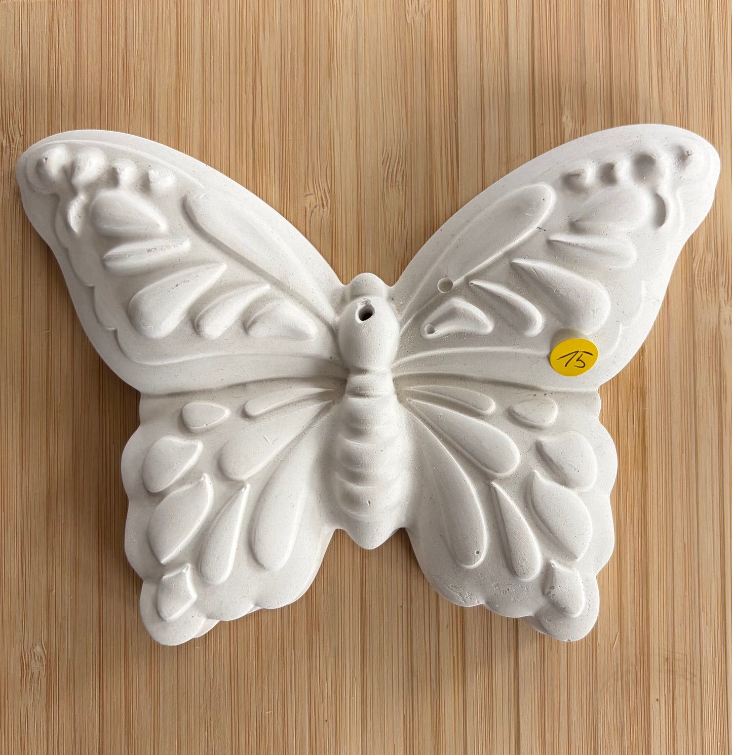 Galet en céramique papillon