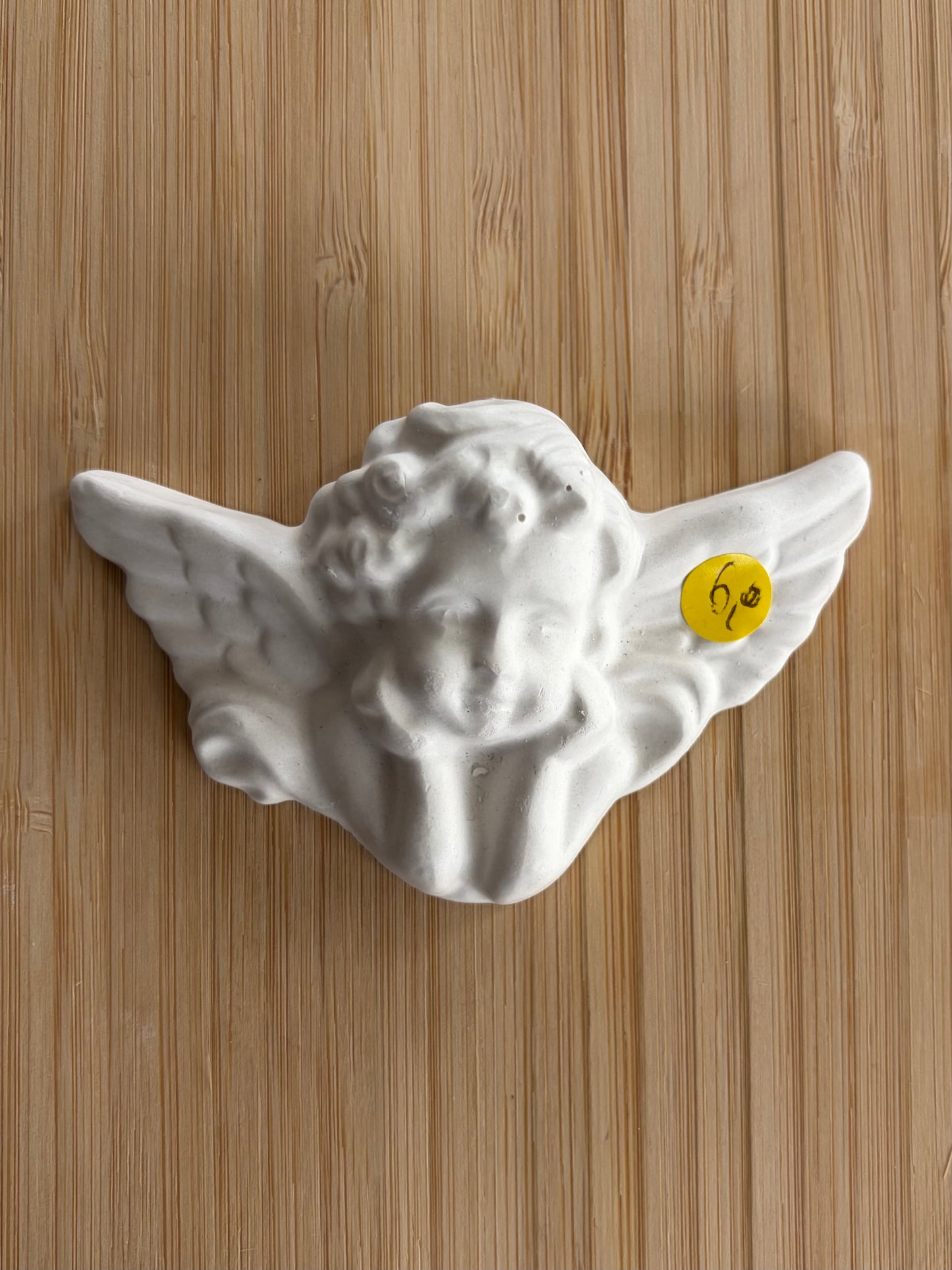 Galet en céramique ange