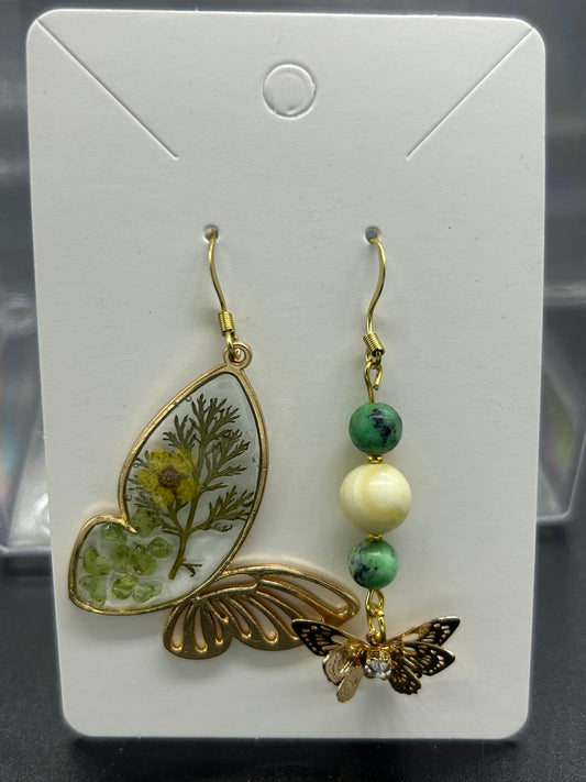 Boucles d’oreilles asymétrique papillon Immunité