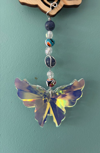 Attrape Soleil Ohm Cristal papillon
